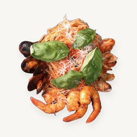 Seafood pasta with shrimp, mussels and basil