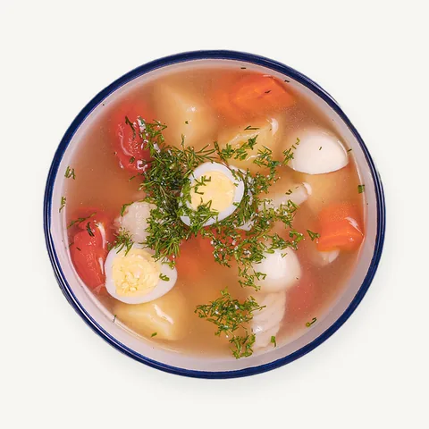 Fish soup with quail eggs and dill